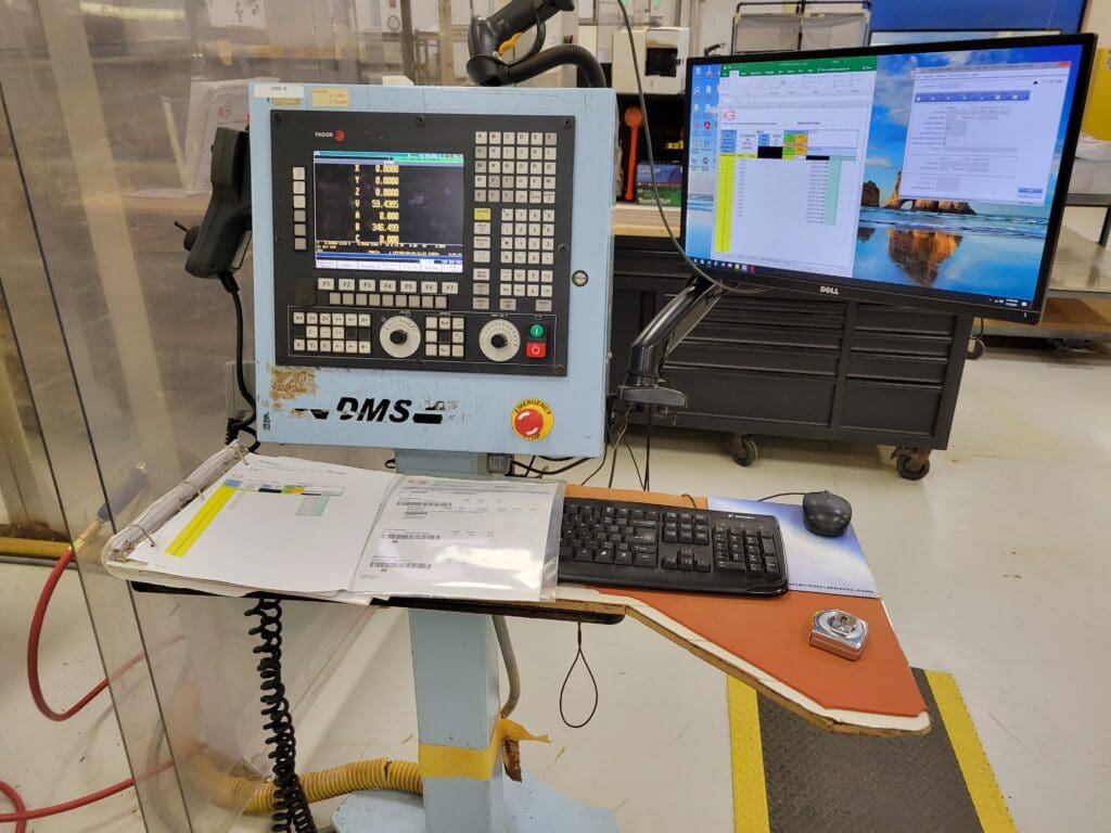 Used DMS 5T5-7-12-48TCOLRx CNC Router for Sale