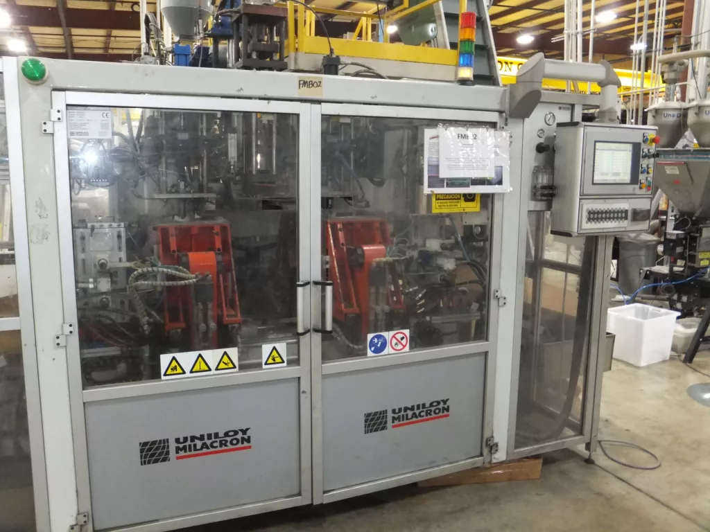 2010 Uniloy Milacron UMS-100D Blow Molder, photo 1 of 19